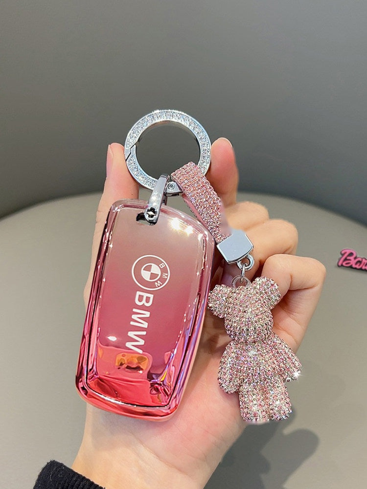BMW clear glossy pink TPU key case with rhinestone bear keychain