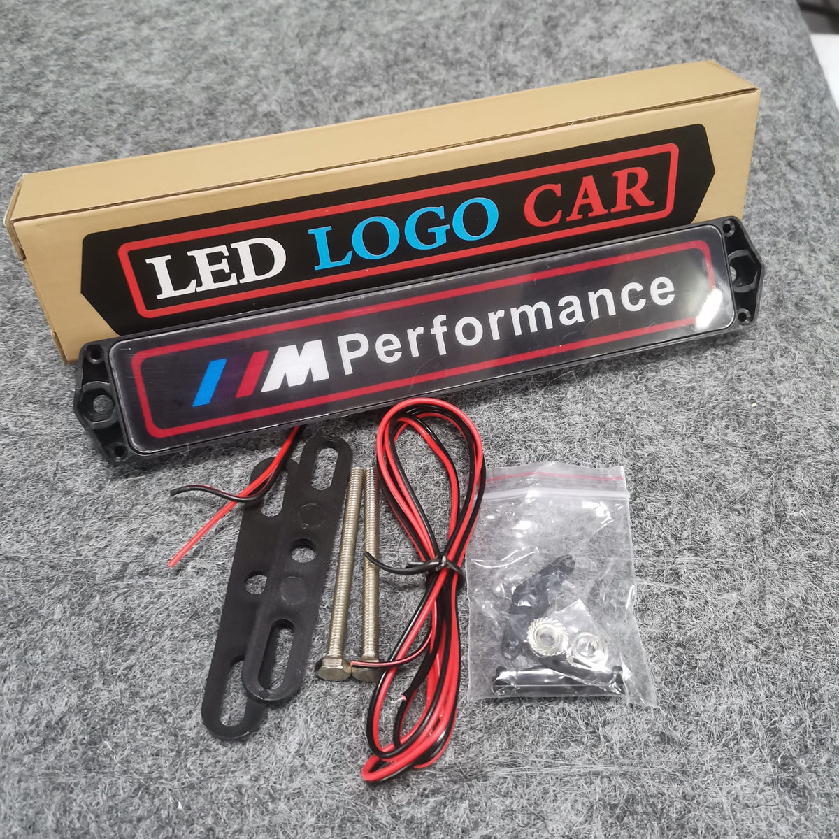 M Performance LED grille badge screw mount kit with brackets and wiring