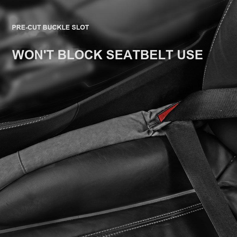 Close-up of BMW seat gap plug buckle slot cut-out next to seatbelt