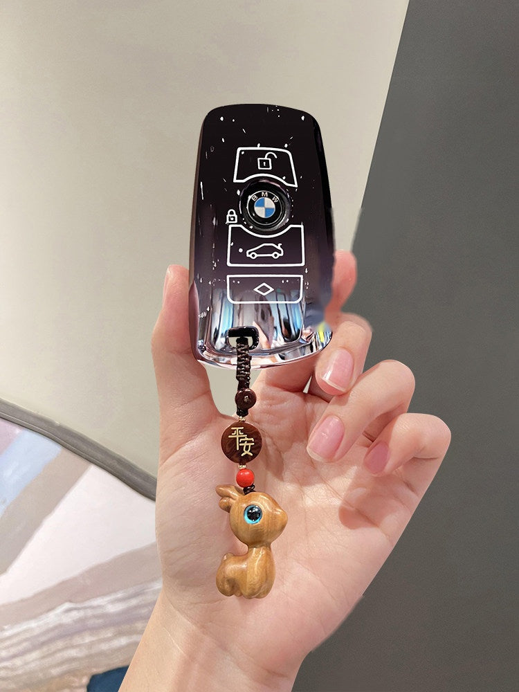 BMW smart key starry sky black TPU sleeve with wood bead and animal charm keychain
