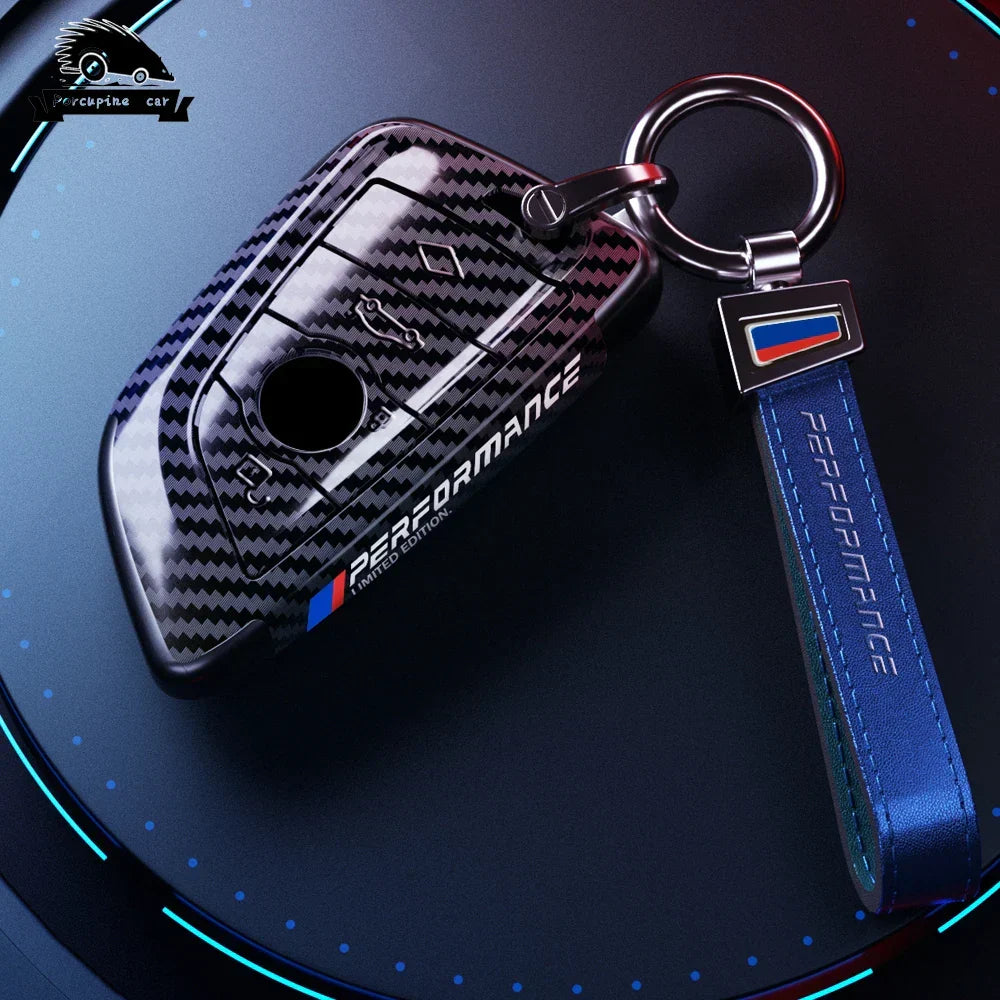 BMW carbon fiber key cover blue leather keychain angle view