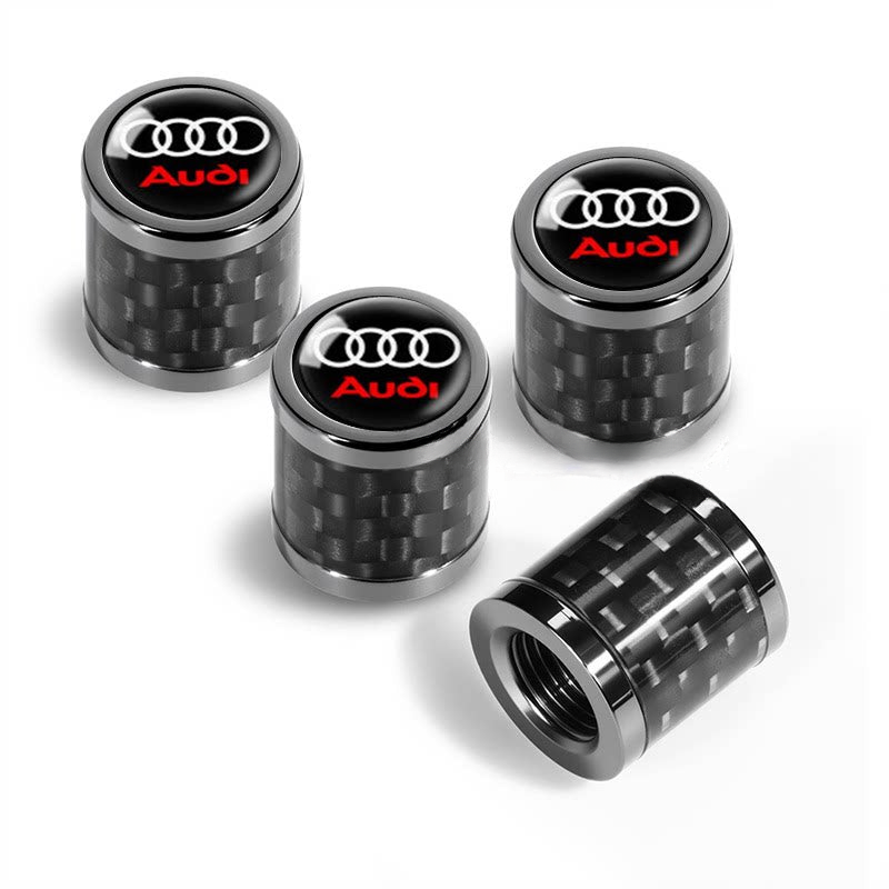 Audi carbon fiber valve caps with four rings and red Audi logo on black