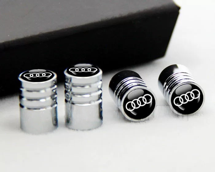 Chrome Audi Four Rings tire valve caps close-up