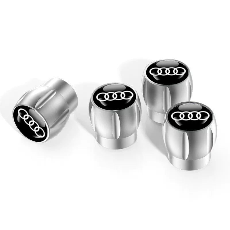 Audi Sport fluted alloy valve caps – Silver with Four Rings Black Emblem