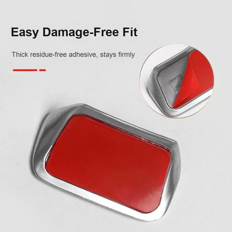 Adhesive backing of the Audi steering wheel badge trim