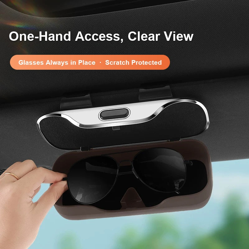 One-hand access to sunglasses in the Audi visor glasses case