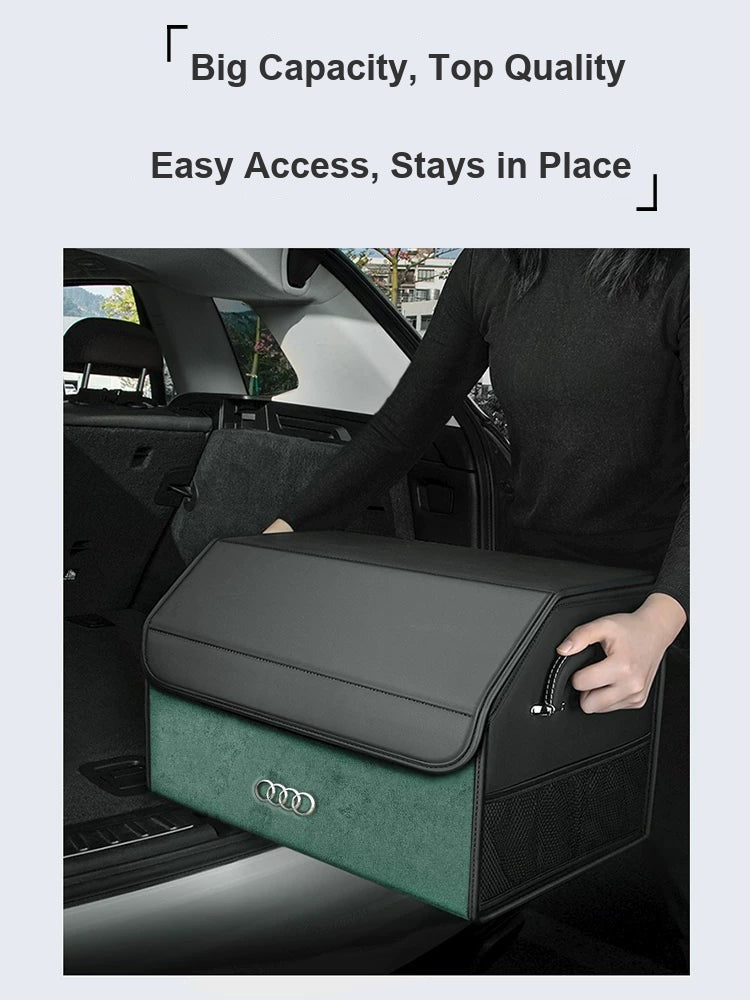Large-capacity Audi trunk organizer being lifted from the boot