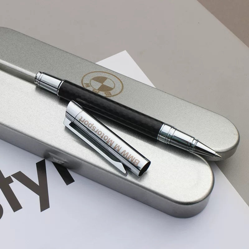 BMW M Motorsport gel pen with chrome cap and carbon pattern metal barrel on the gift tin