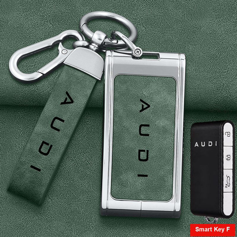 Silver shell with green leather and double buckle strap