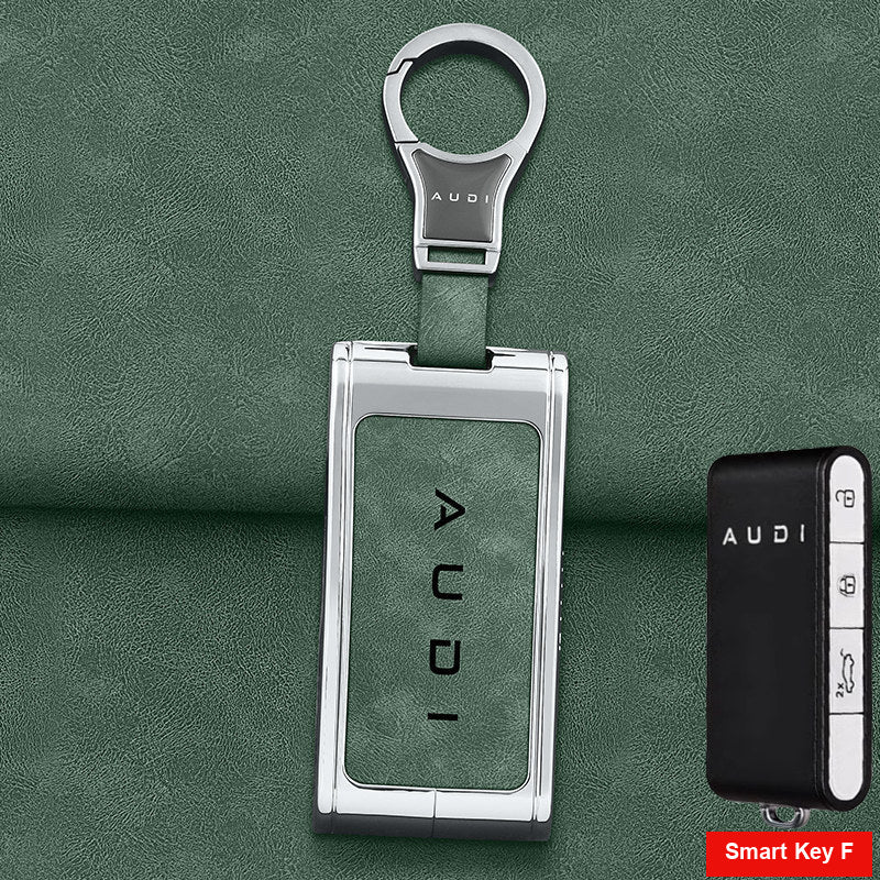 Silver shell with green leather and metal clasp