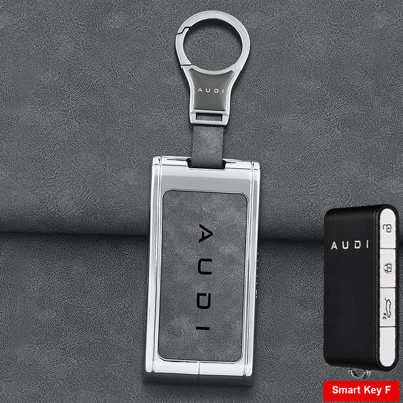 Silver shell with grey leather and metal clasp