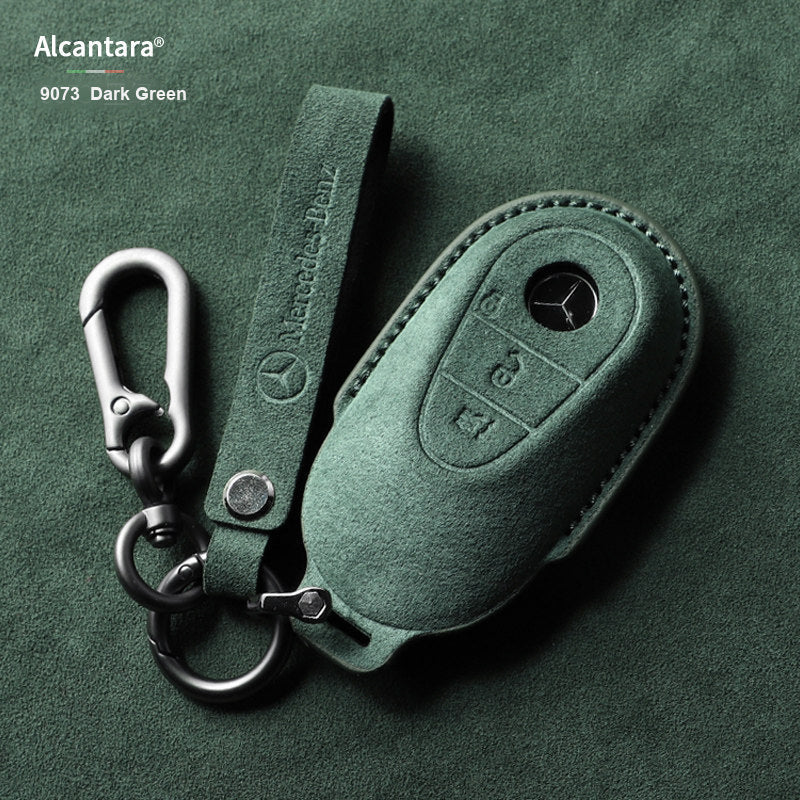 Dark Green Alcantara key case with strap detail