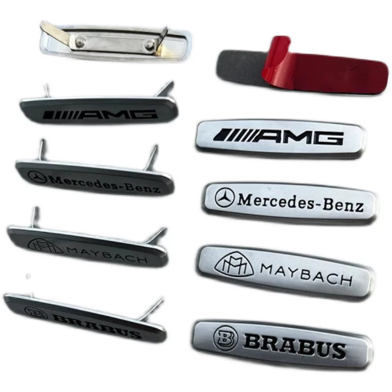 Brushed metal AMG, Mercedes-Benz, Maybach and Brabus seat emblems with clip-in prongs or adhesive backing