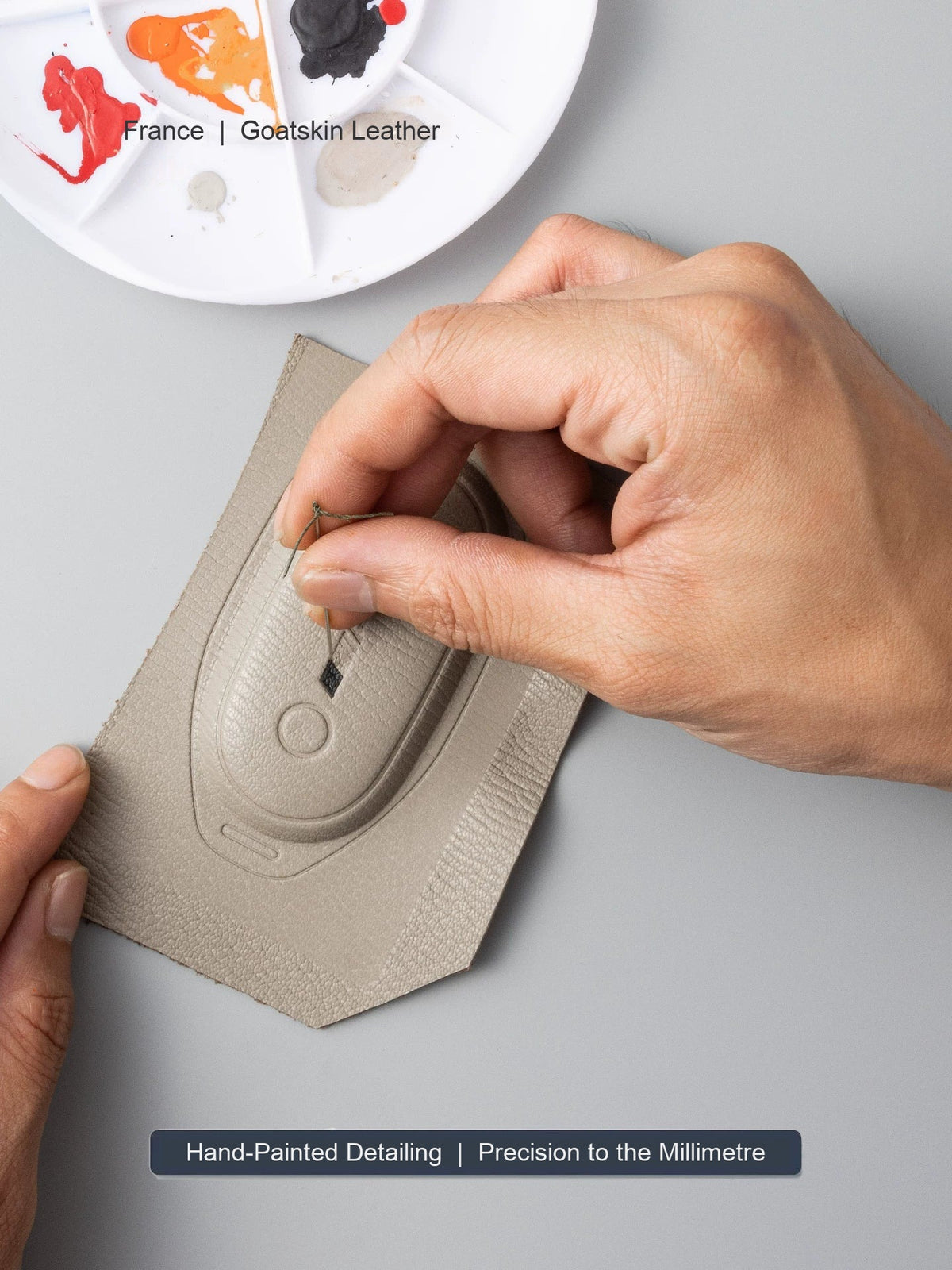 Hand-painting the goatskin leather for a Mercedes-Benz key case