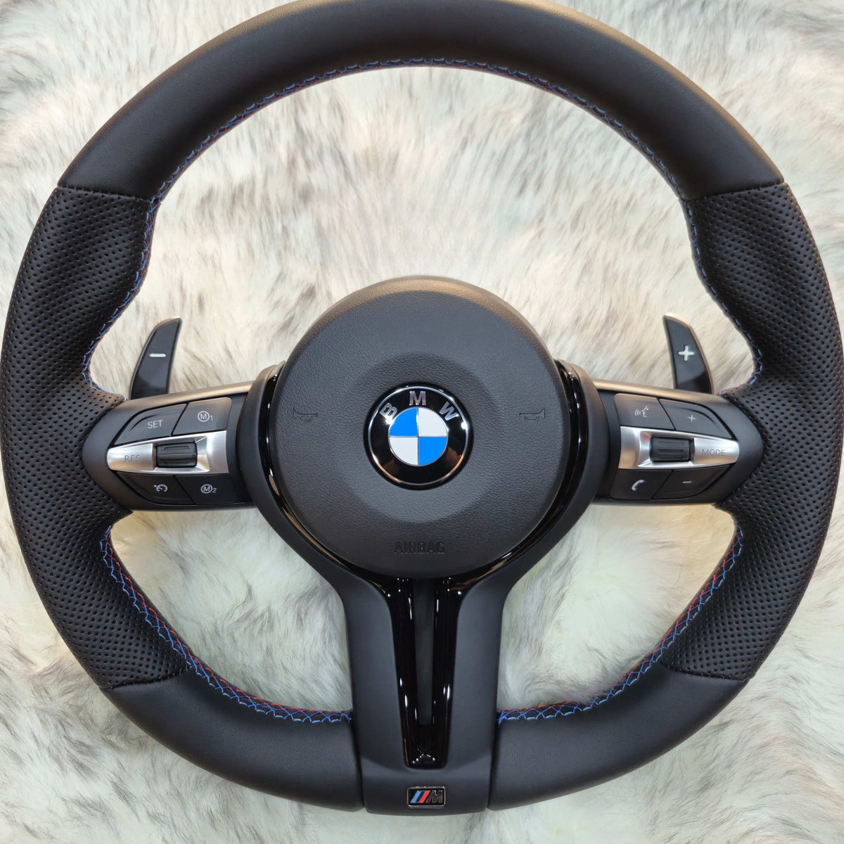 Perforated Nappa leather steering wheel with black trim for BMW F Series - front view