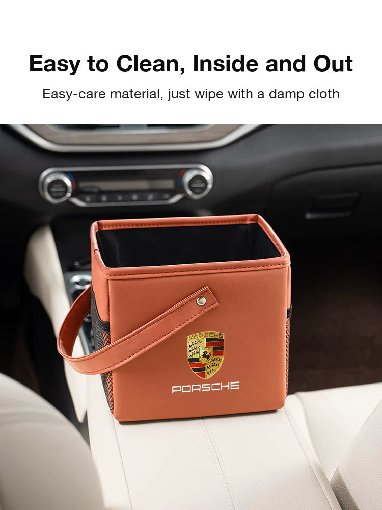 Orange Porsche storage box on the center console, easy to wipe clean