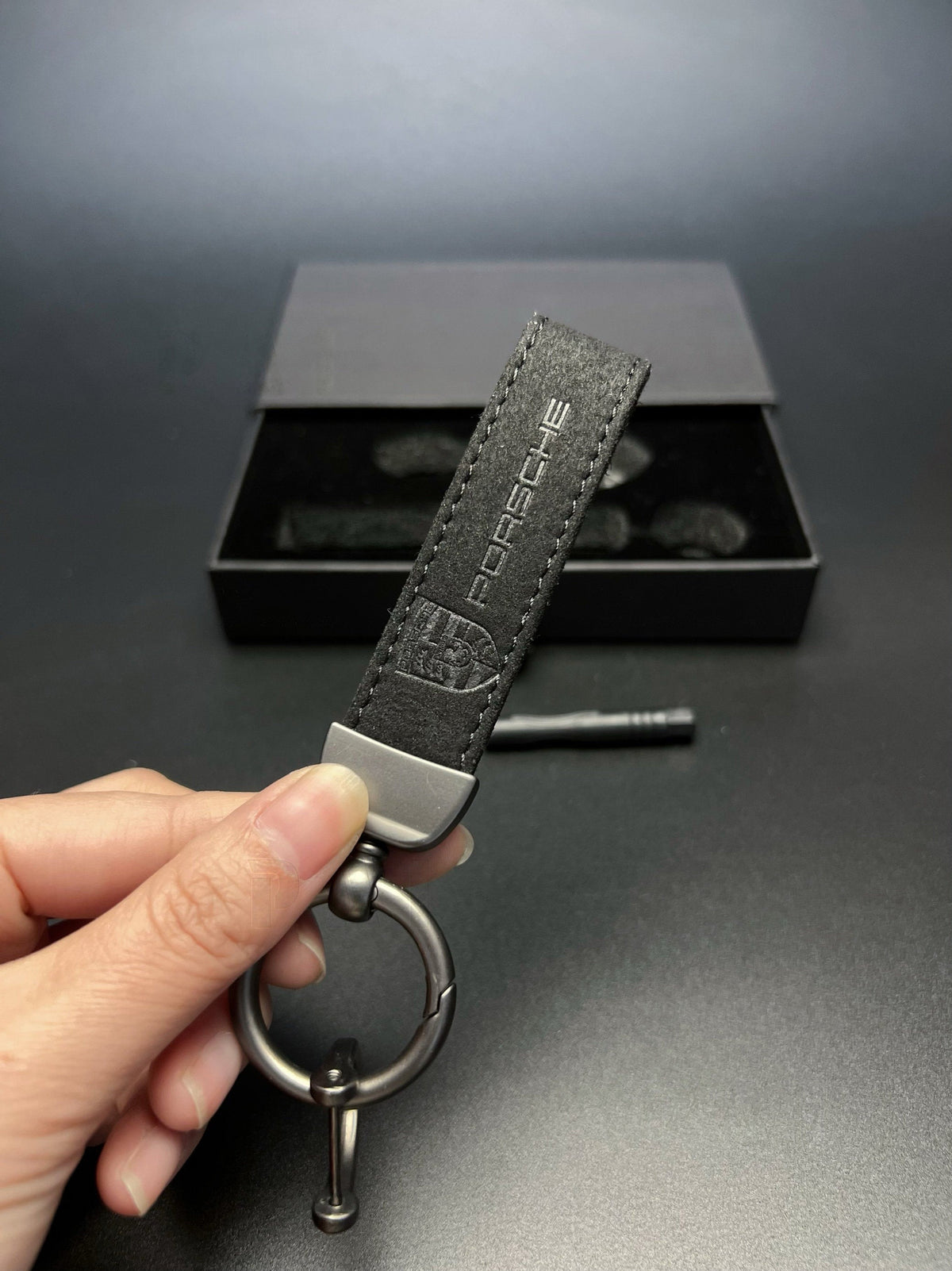 Porsche black suede key strap with metal key ring