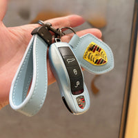 Porsche Key Case Set – Glossy Shell with Wrist Strap and Crest Keychain for Macan, Cayenne, Panamera, 911, Taycan and 718