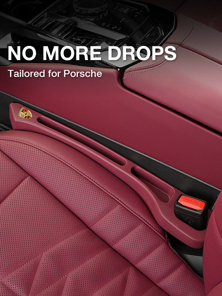 Porsche crest seat gap filler in Bordeaux Red fitted between seat and centre console