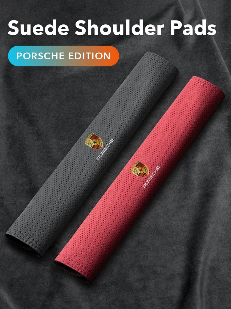 Porsche suede seat belt shoulder pads in Premium Black and Flame Red with the Porsche crest